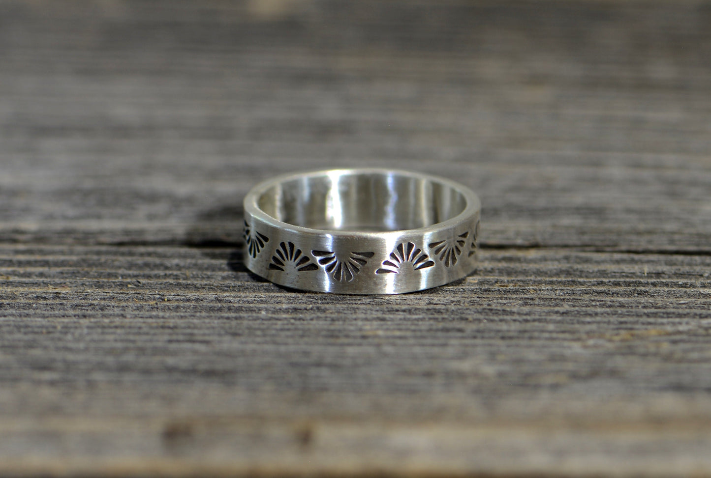 Sterling silver ring with hand stamped southwestern pattern