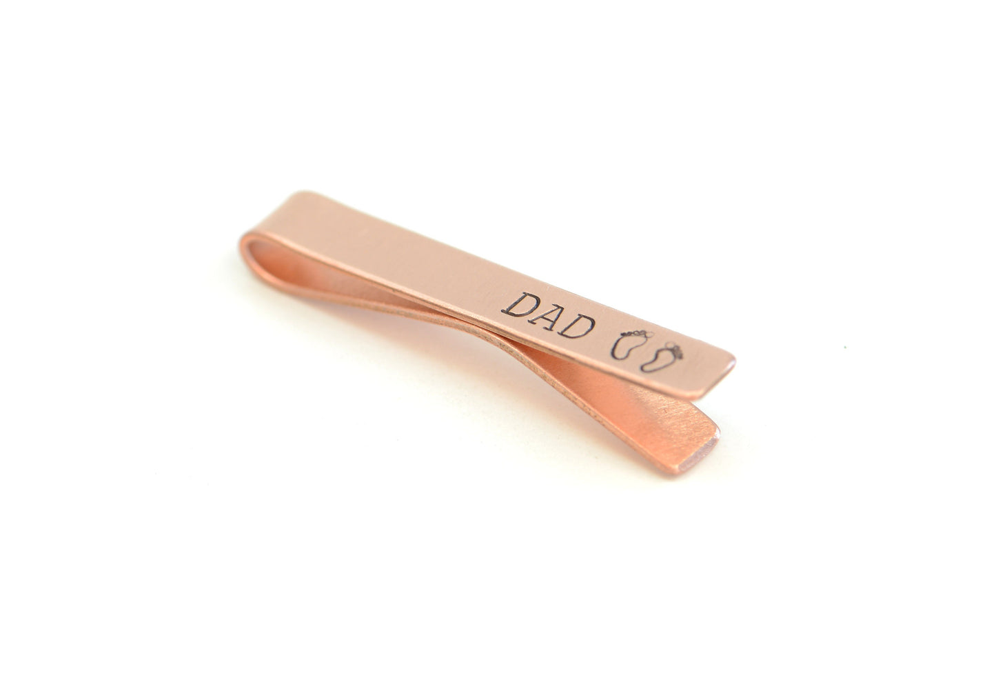 Copper tie clip for new dad stamped with DAD and baby feet