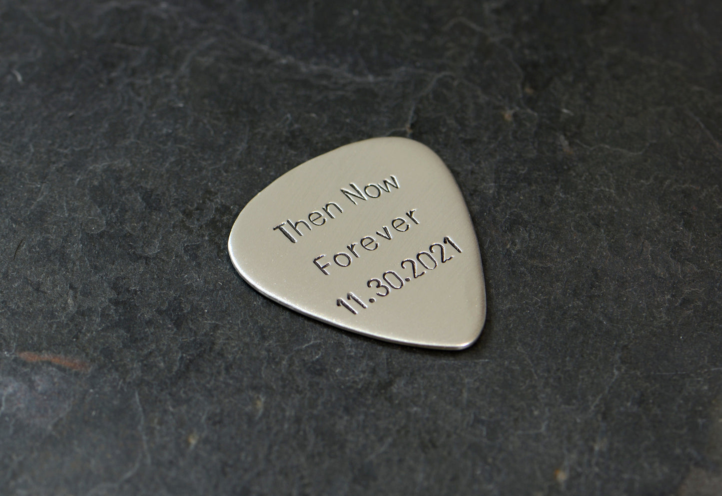 Then now and forever sterling silver guitar pick