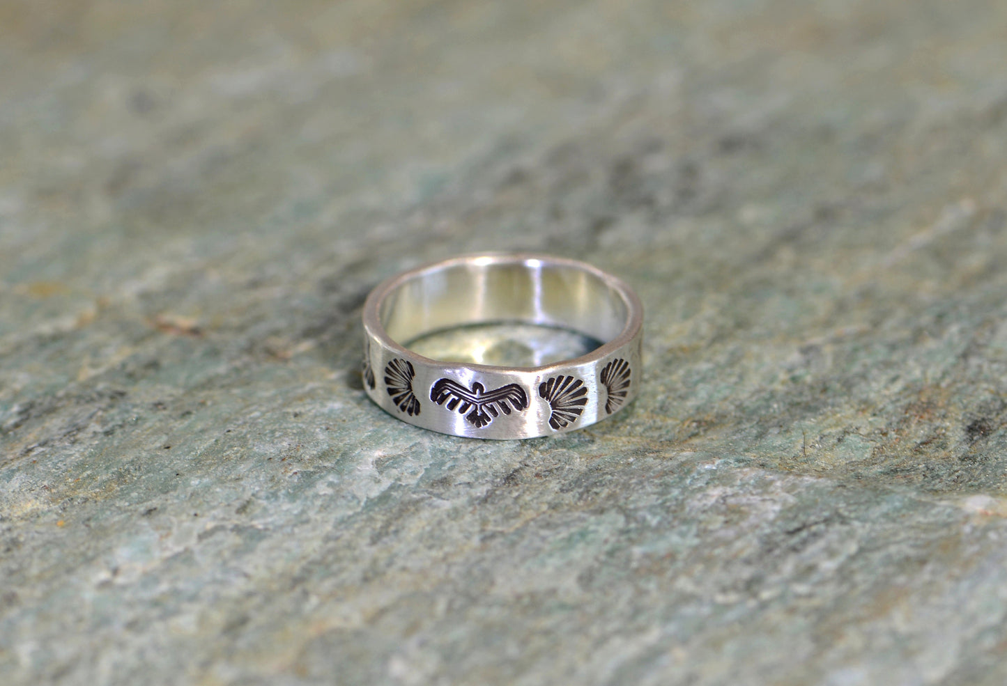 Sterling silver ring with Thunderbird pattern