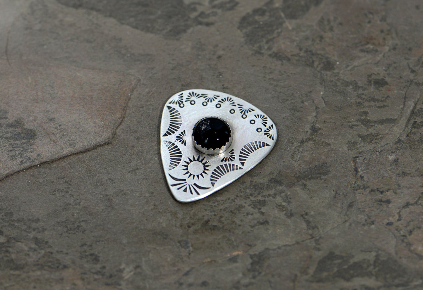 Guitar pick with Onyx on sterling silver
