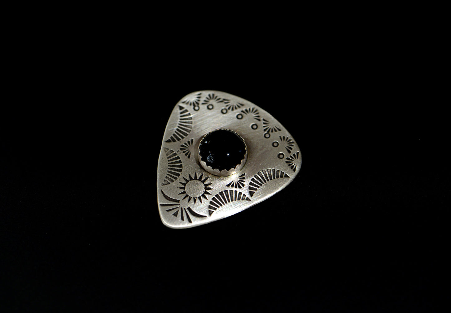 Guitar pick with Onyx on sterling silver