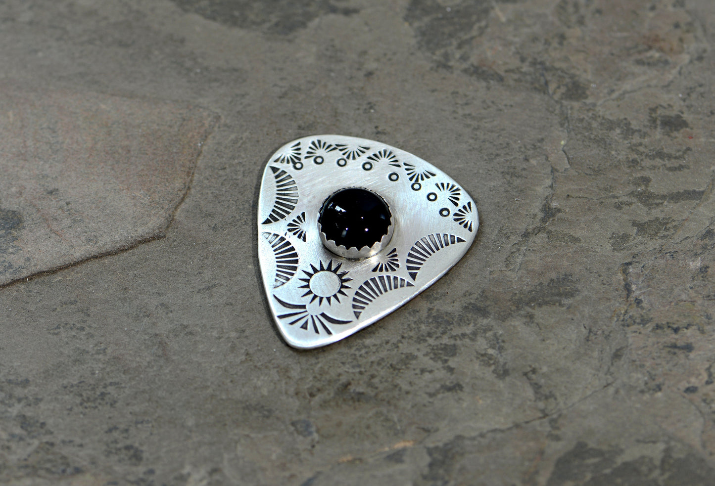 Guitar pick with Onyx on sterling silver