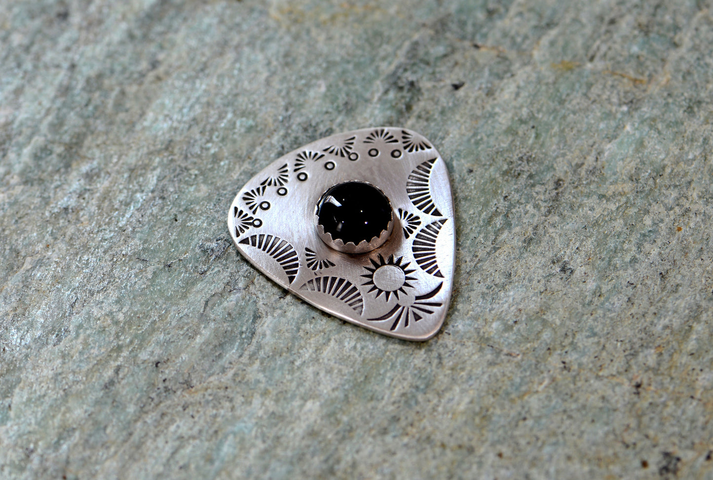 Guitar pick with Onyx on sterling silver