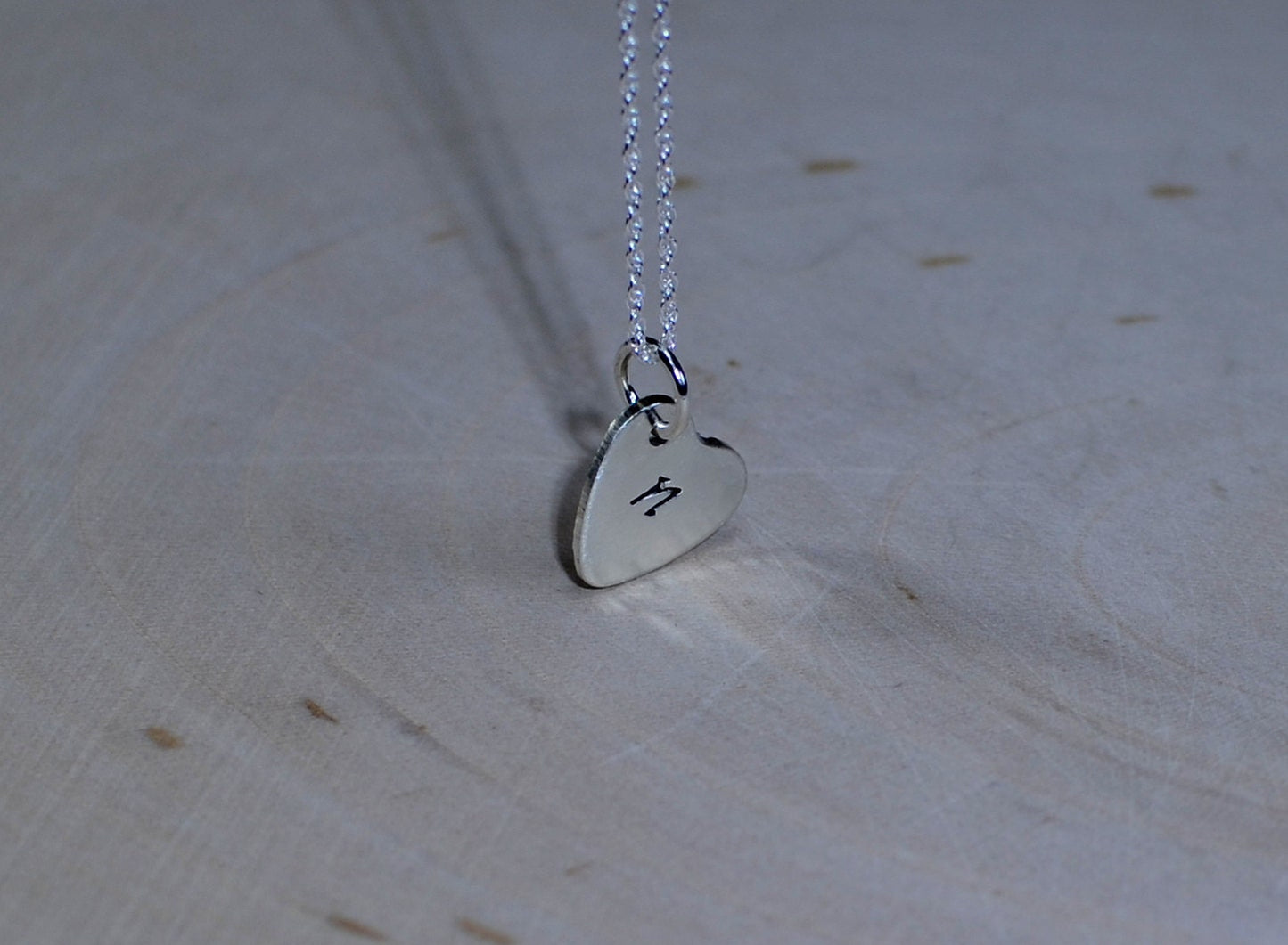 Engraved initial in sterling silver heart charm