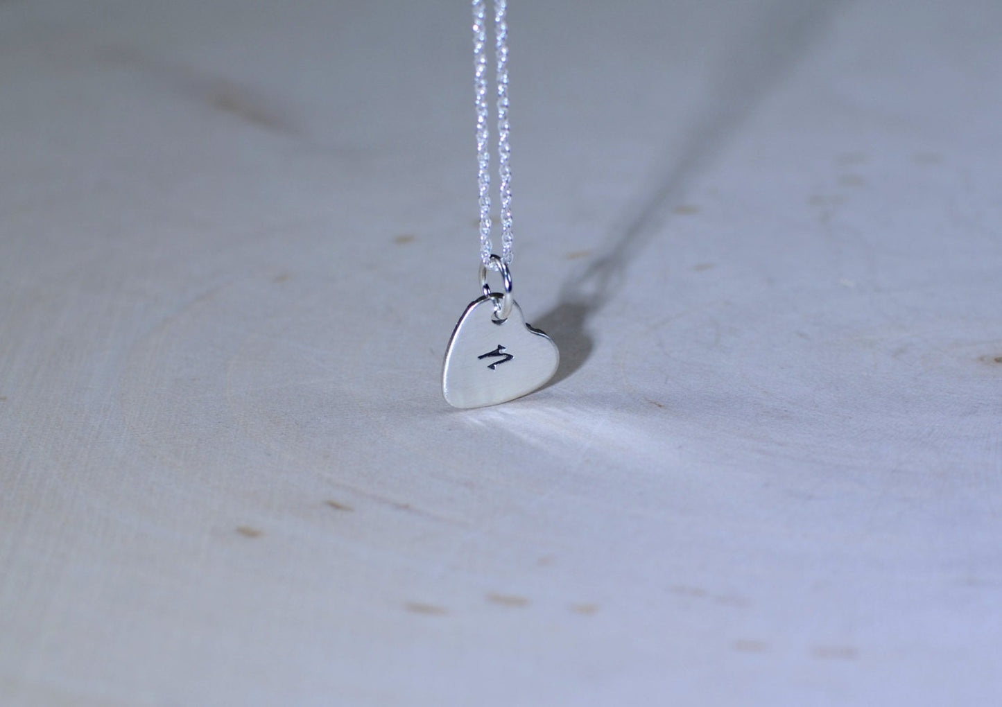 Engraved initial in sterling silver heart charm