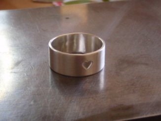 Sterling silver heart ring with cutout heart design