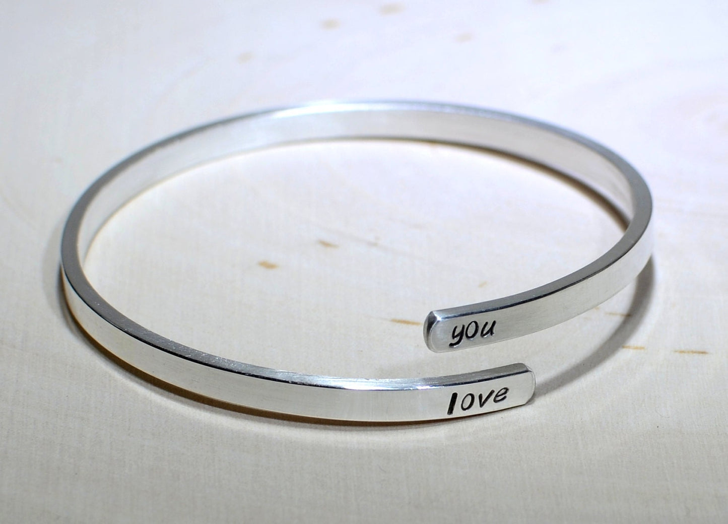 Upper arm cuff in sterling silver with personalizations