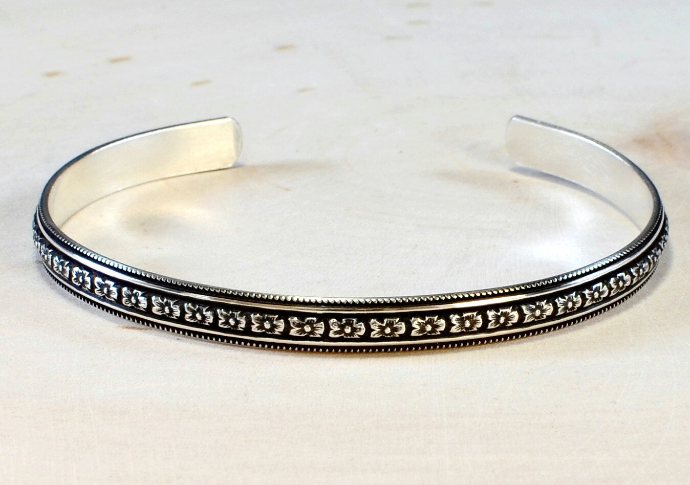 Sterling Silver Hibiscus Flower Patterned Bracelet with dark Patina