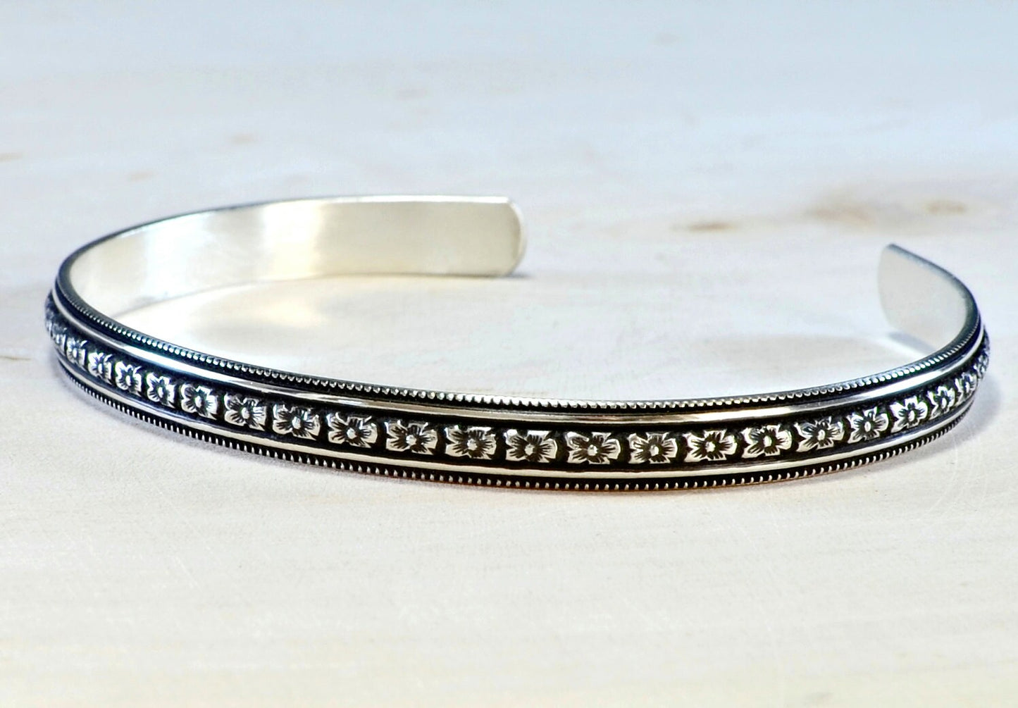 Sterling Silver Hibiscus Flower Patterned Bracelet with dark Patina