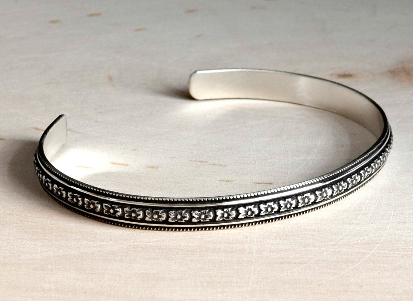 Sterling Silver Hibiscus Flower Patterned Bracelet with dark Patina