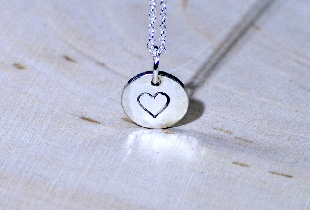 Sterling Silver Disc with a Heart Theme