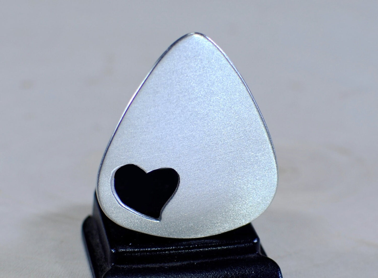 Love Guitar Pick with Cutout Heart in various metals