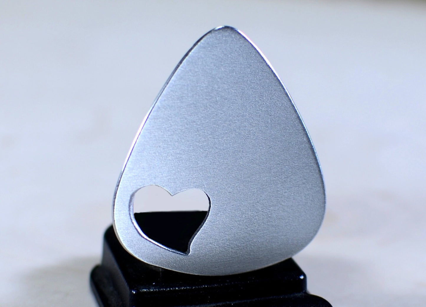 Love Guitar Pick with Cutout Heart in various metals