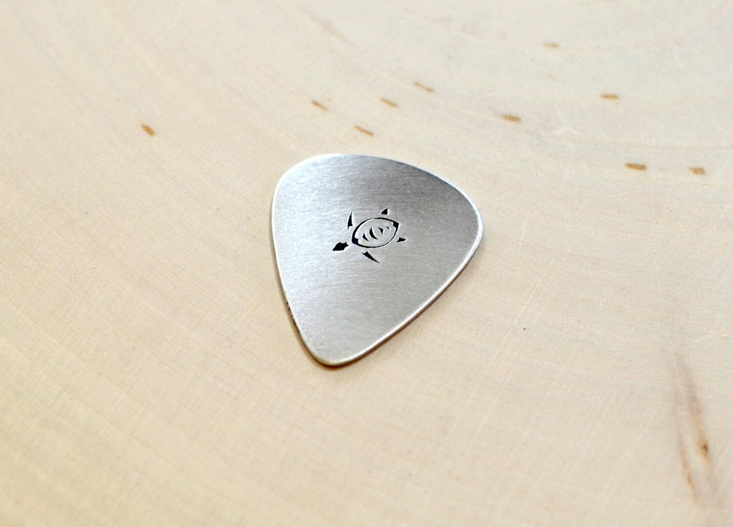 Sea turtle aluminum guitar pick handmade in aluminum for peace and tranquility in your music
