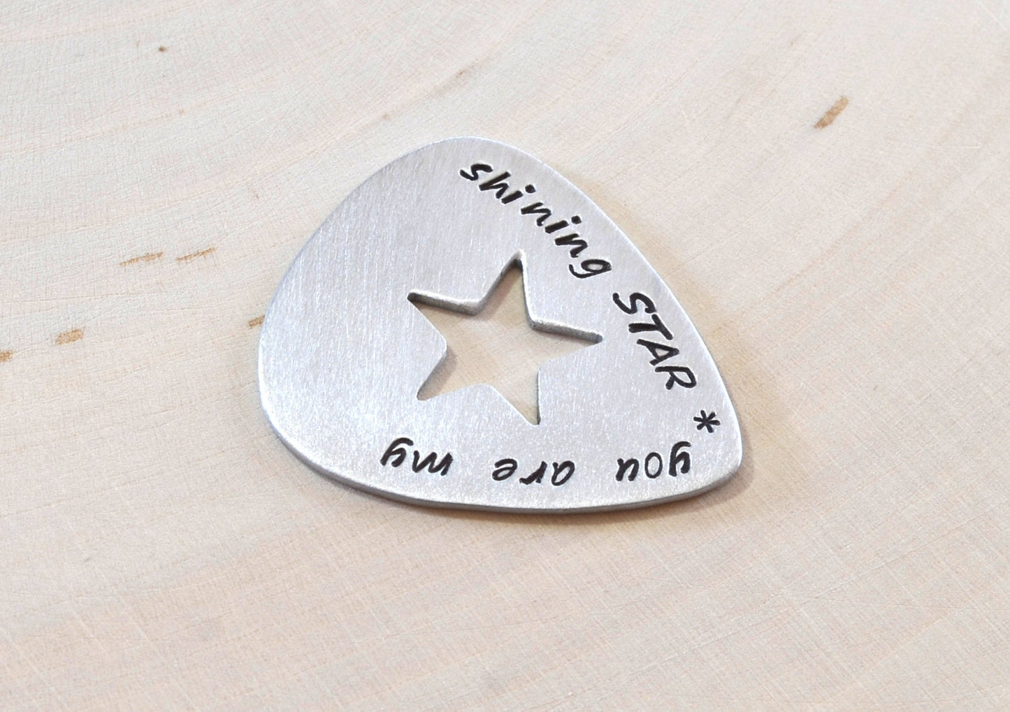 Guitar pick for your shining star in aluminum