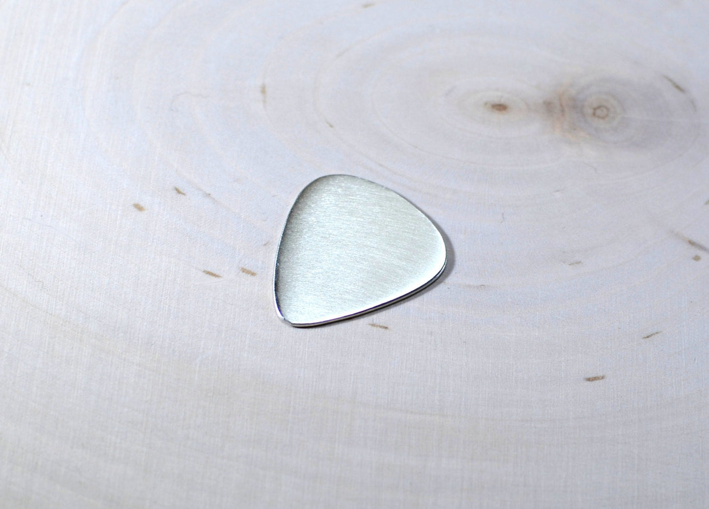 Sterling silver guitar pick ready to personalize