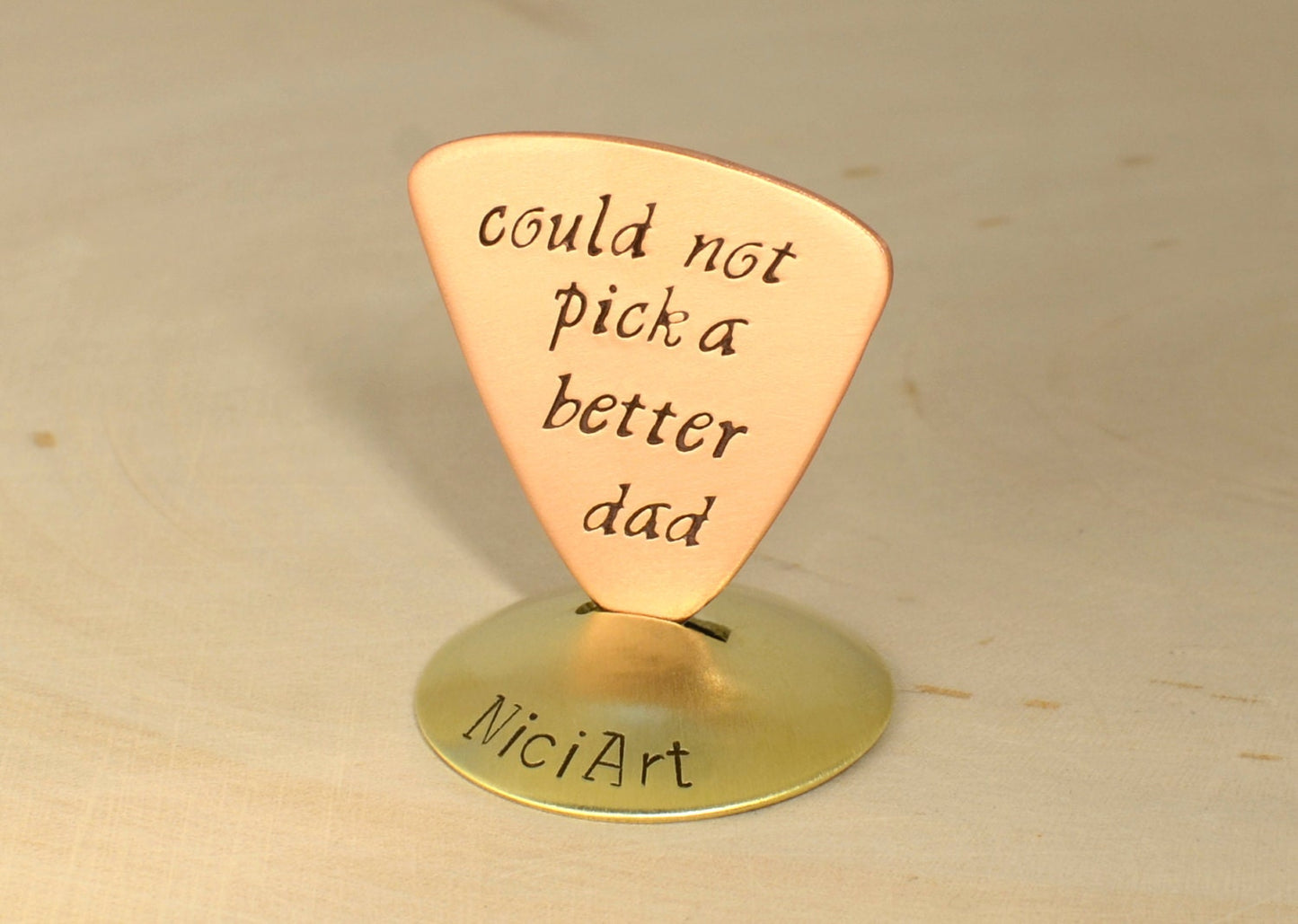 Copper Triangular Guitar Pick stamped with Couldn't Pick a Better Dad
