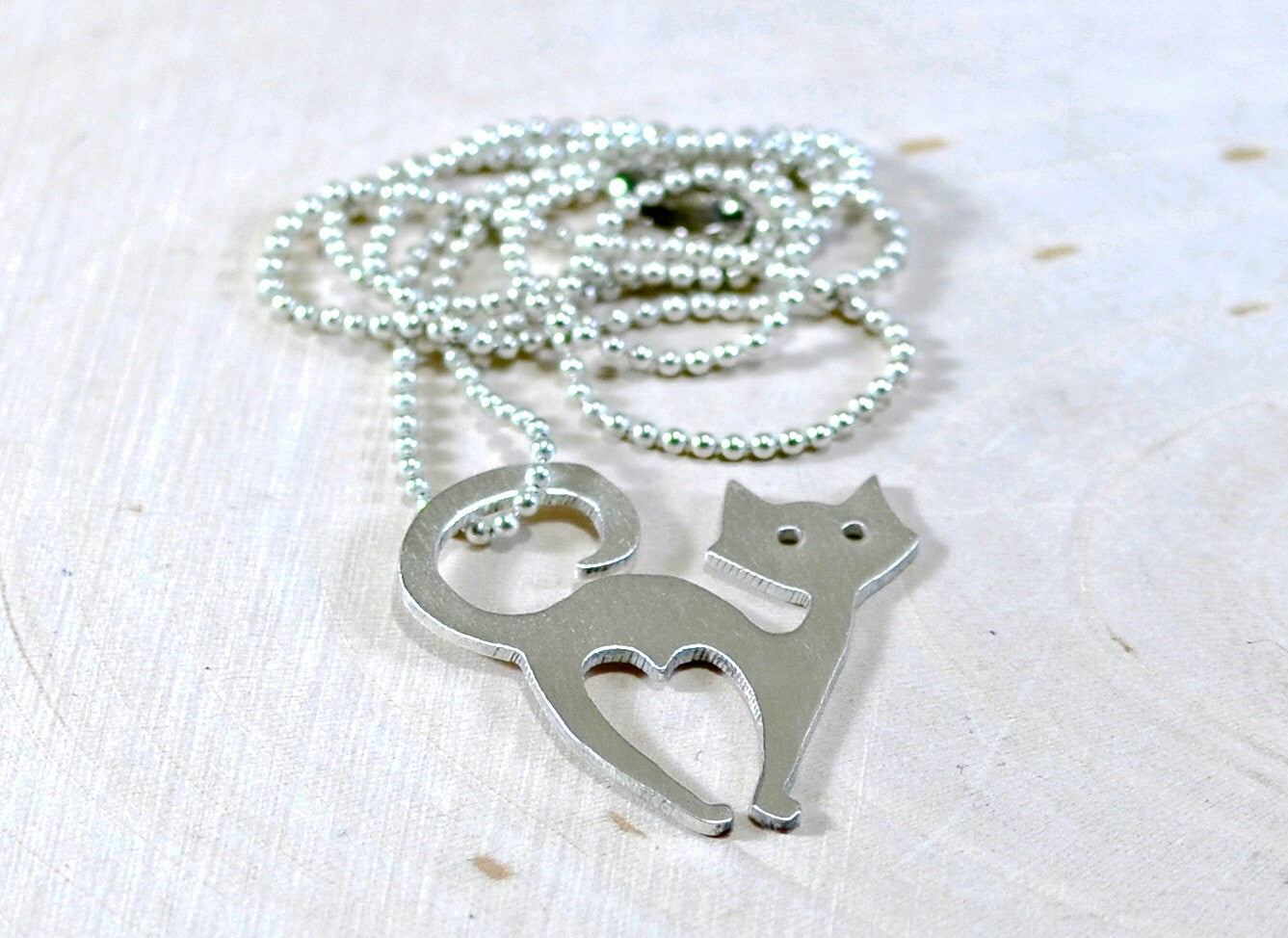 Handcrafted cat necklace in sterling silver