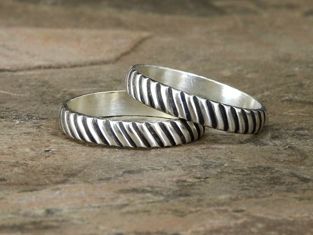 Sterling Silver Couples Ring Set in Sterling Silver with Interlocking Gear Design