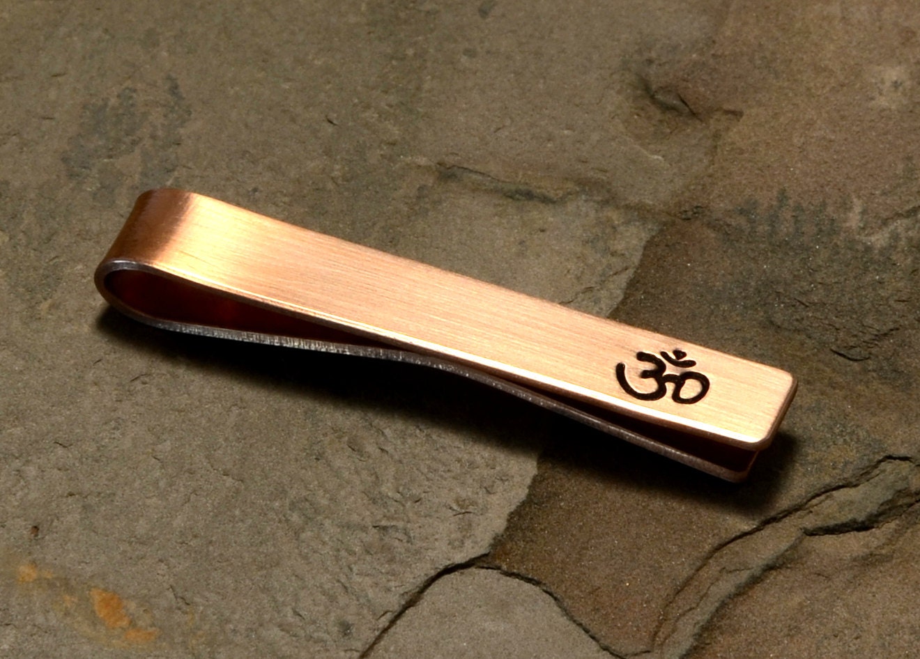 Yoga themed copper tie clip with Aum