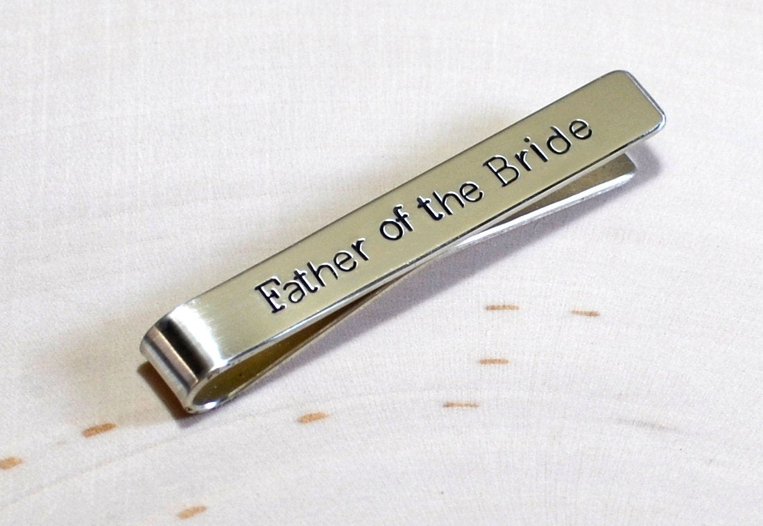 Father of the bride on a sterling silver tie clip