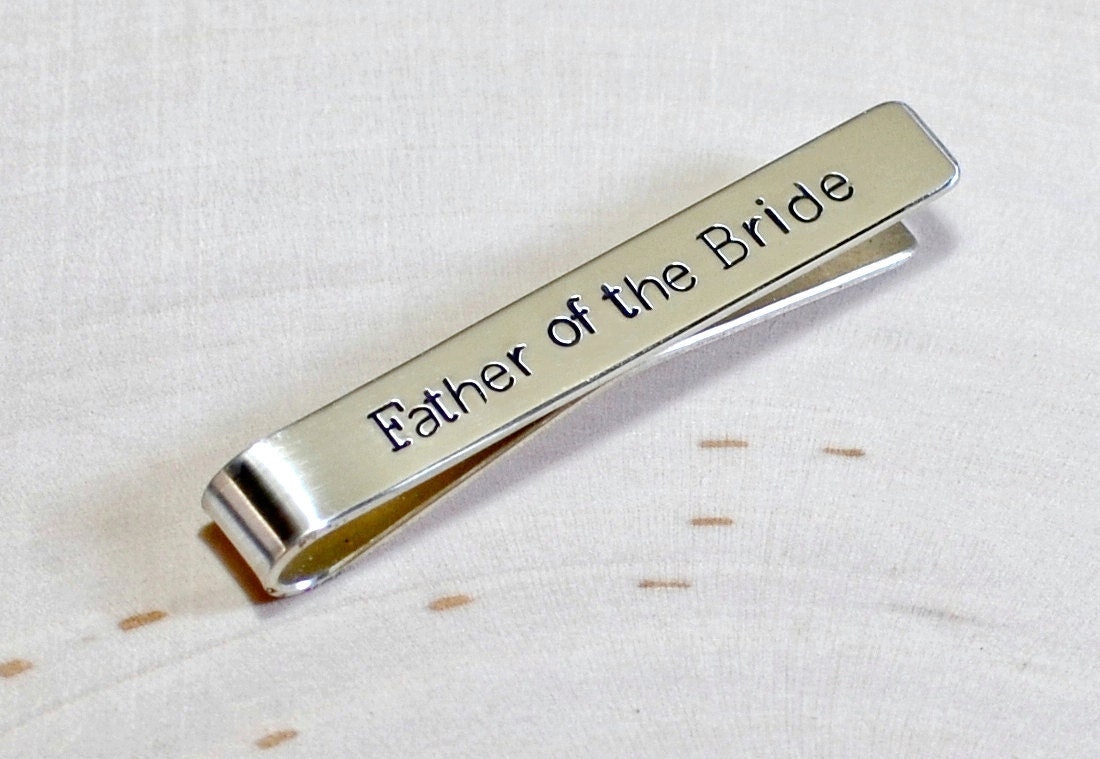 Father of the bride on a sterling silver tie clip