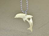 Jumping dolphin pendant with heart in bronze, NiciArt 