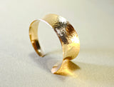 Hammered bronze cuff bracelet with anticlastic form and tapered curve, NiciArt 
