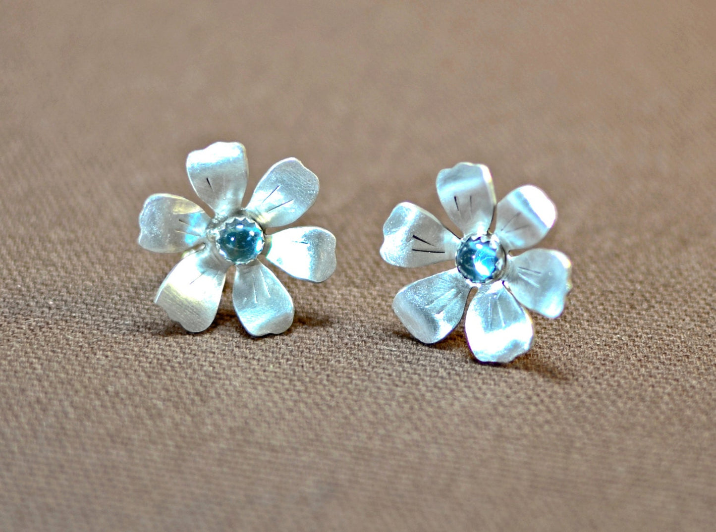 Sterling silver handcrafted flower earrings with blue topaz