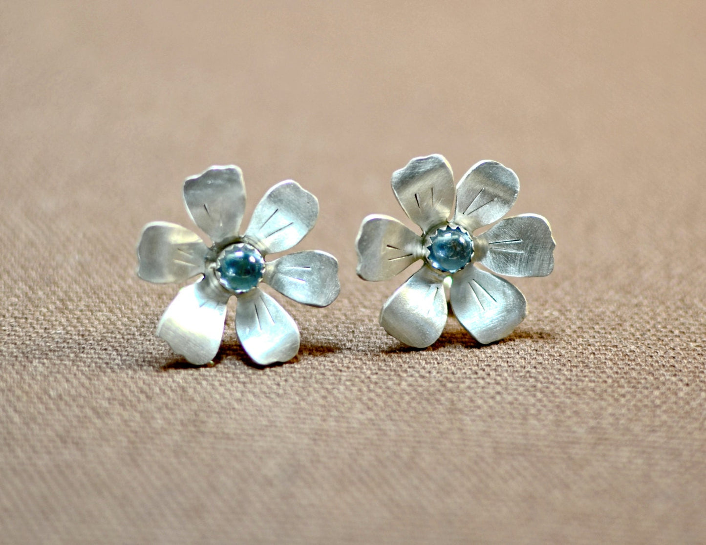 Sterling silver handcrafted flower earrings with blue topaz