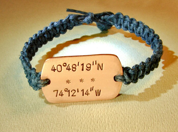Personalized latitude longitude coordinates on a copper tag with woven blue hemp bracelet