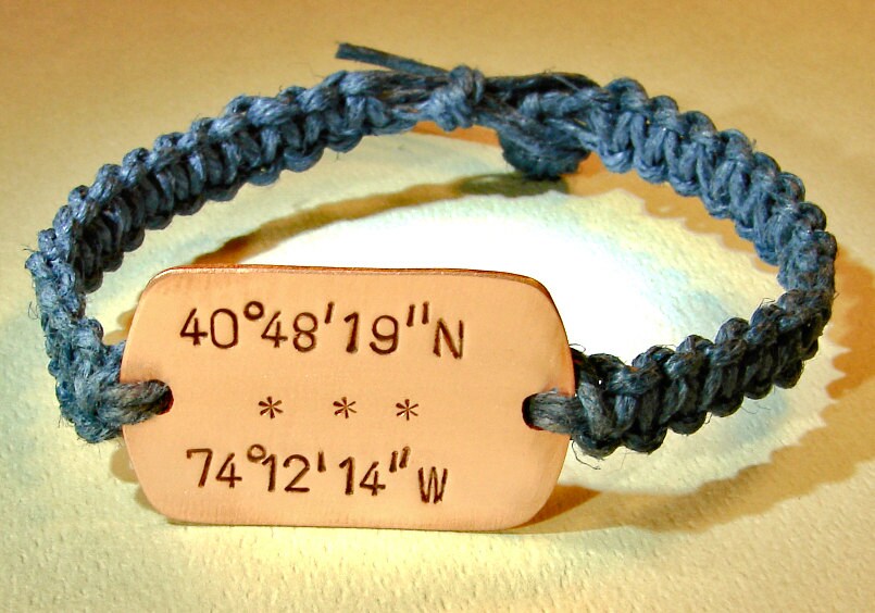 Personalized latitude longitude coordinates on a copper tag with woven blue hemp bracelet