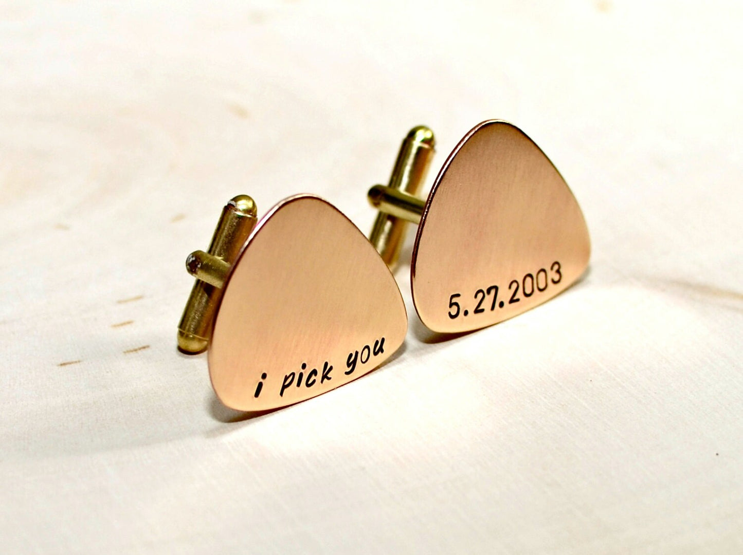 Bronze guitar pick cuff links engraved with I Pick You and wedding date