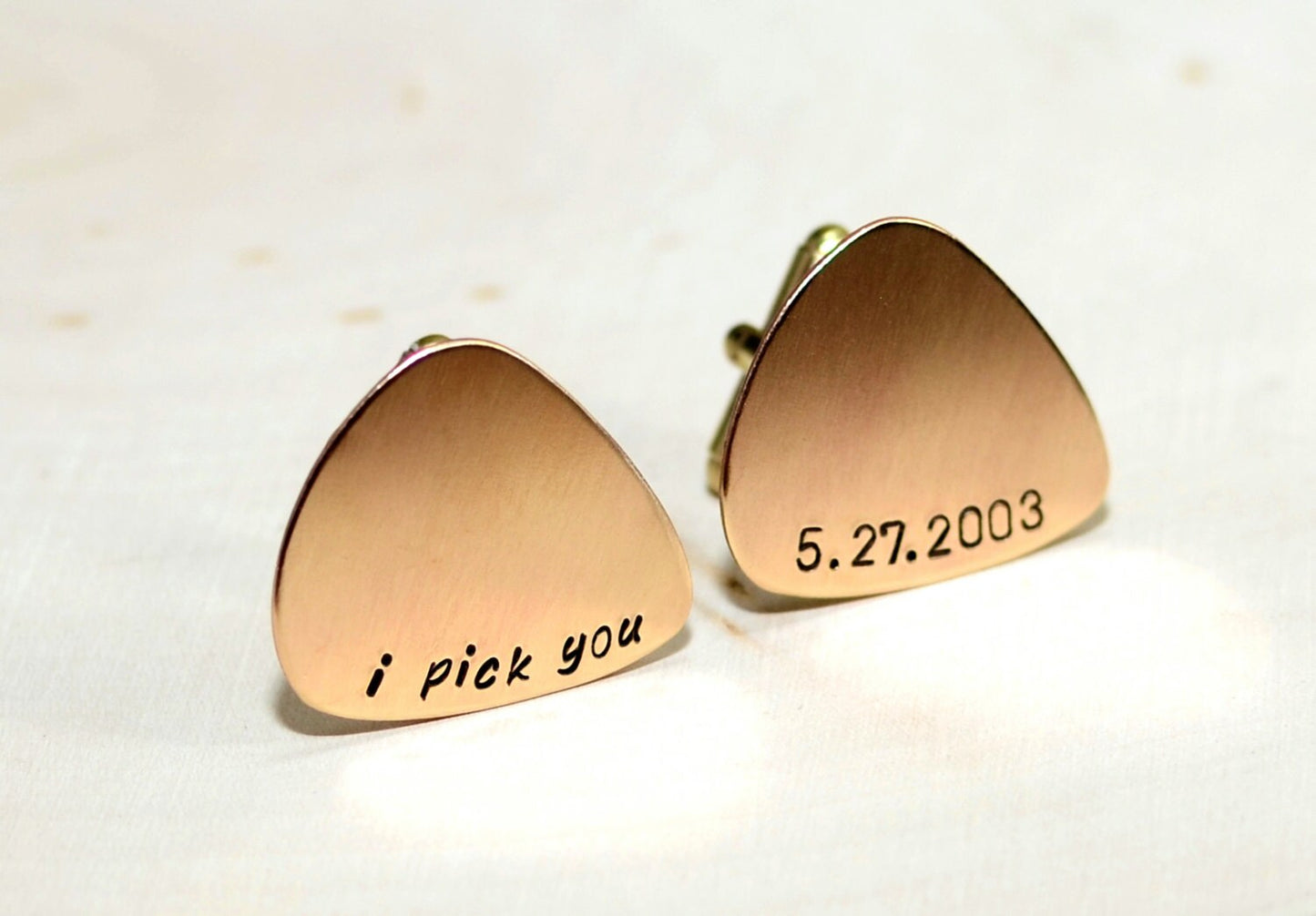 Bronze guitar pick cuff links engraved with I Pick You and wedding date