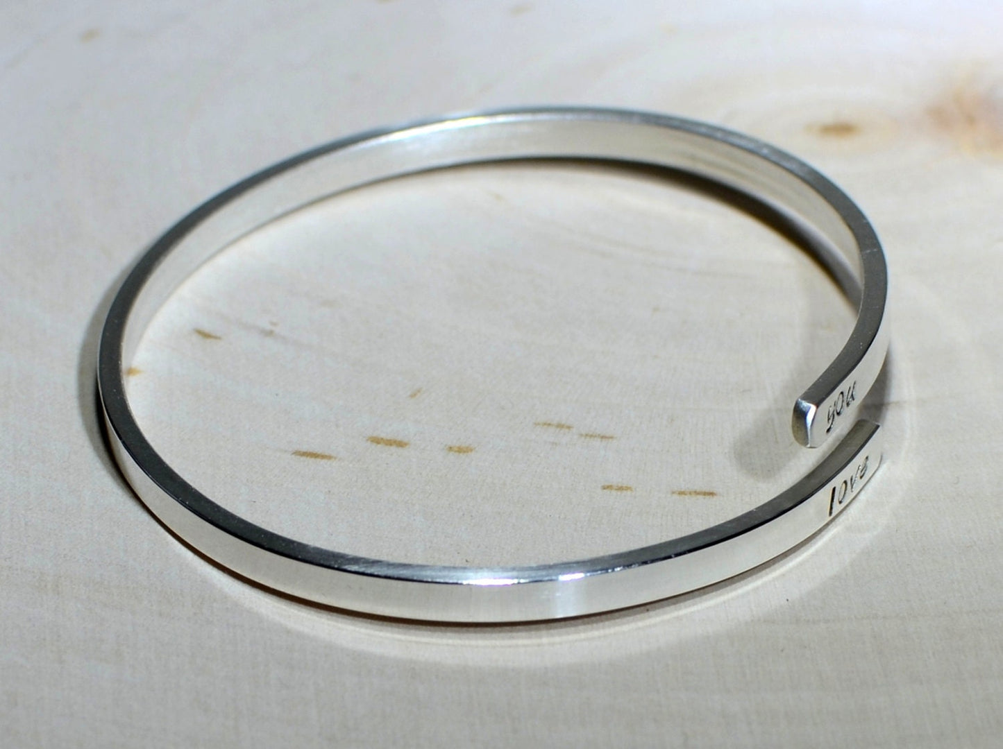 Upper arm cuff in sterling silver with personalizations