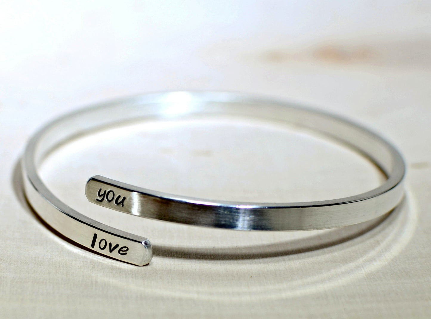 Upper arm cuff in sterling silver with personalizations