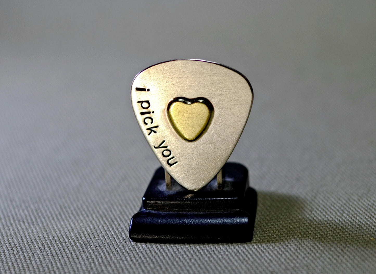 Sterling silver guitar pick and brass heart handcrafted with love
