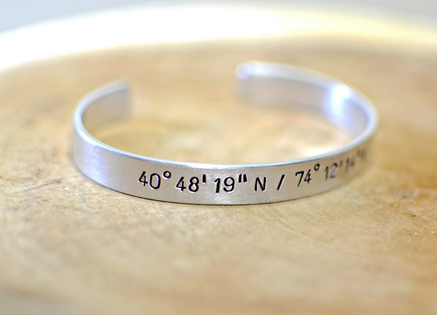 Latitude longitude personalized coordinates in aluminum cuff bracelet