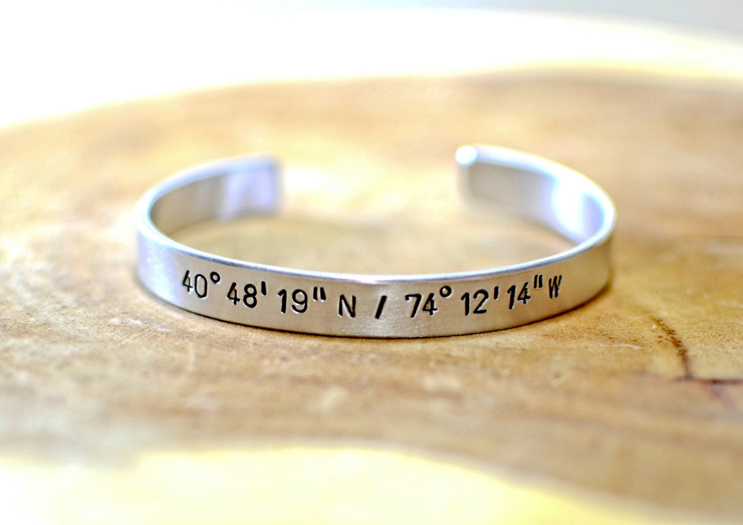Latitude longitude personalized coordinates in aluminum cuff bracelet